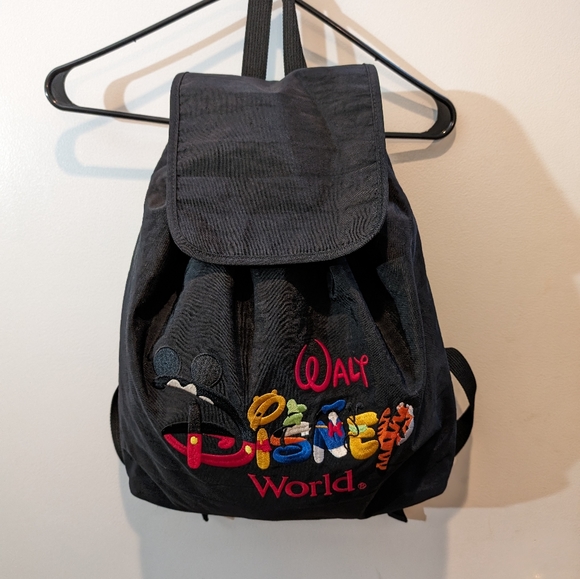 Disney Handbags - Embroidered Colorful DISNEY Backpack. Inside zipper pocket.